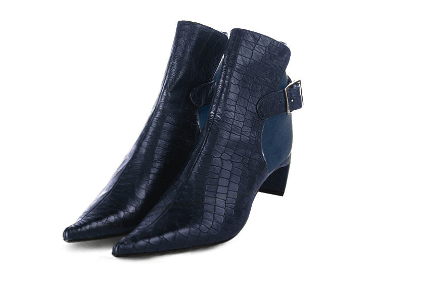 Navy blue women's ankle boots with buckles at the back. Pointed toe. Medium comma heels. Front view - Florence KOOIJMAN